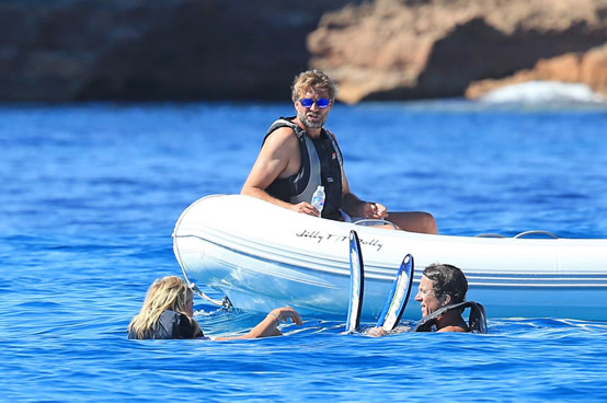 KLOPPLESS Jurgen Klopp on holiday with wife Ulla and topless blonde in Mediterranean as Liverpool boss prepares for new season
