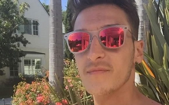 Arsenal star Mesut Ozil holidaying with potentially biggest Premier League buy of summer
