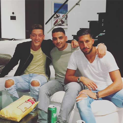 Arsenal's Mesut Ozil hangs out with Liverpool star on holiday