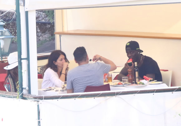 Mario Balotelli smoking: Liverpool striker hinders search for new club as he's pictured puffing on cigarette in Italy