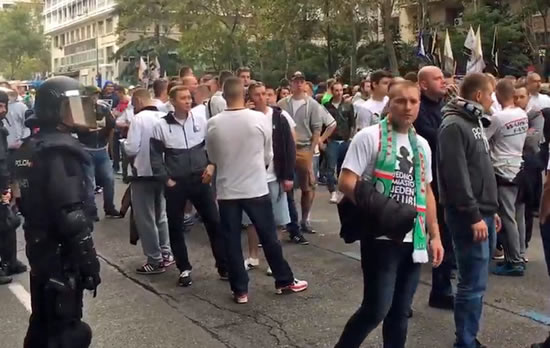 Legia supporters clash with police outside the Bernabeu