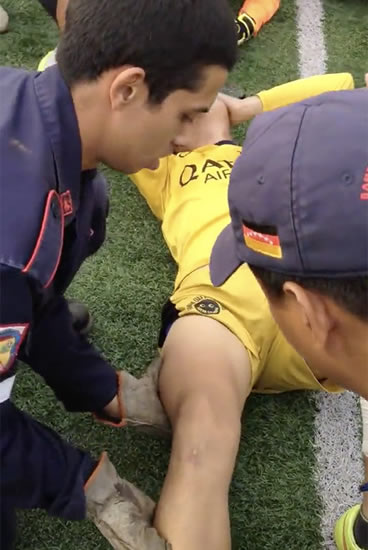 GRAPHIC CONTENT: Footballer writhes in agony after leg pulled out place in horrific video