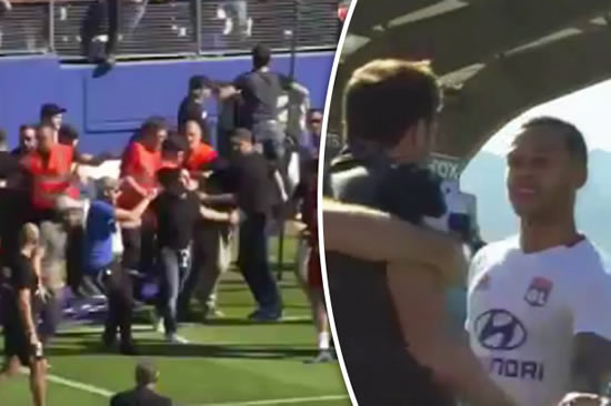 Fans square up to former Man United ace as Ultras STORM pitch