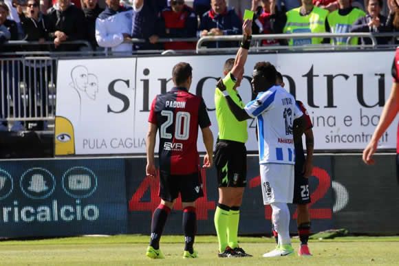 JUST NOT RIGHT Sulley Muntari BOOKED and criticised for complaining about racist chanting