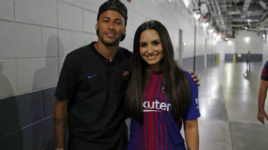 Neymar poses with Demi Lovato after exchanging messages on Instagram