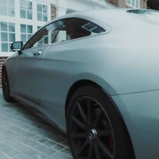 Arsenal star Mesut Ozil shows off luxury mansion complete with two sports cars, cinema and HUGE shoe collection