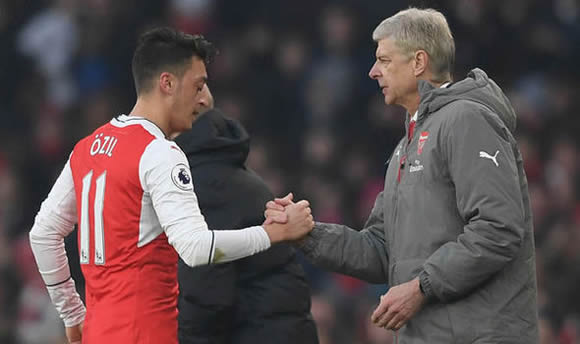 Manchester United think Mesut Ozil has a problem with Arsene Wenger