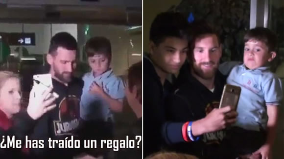 Thiago Messi attempts to avoid selfies