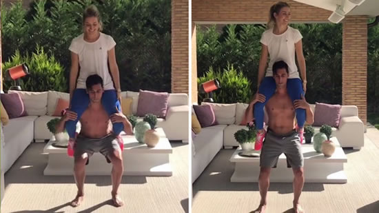 Arbeloa works out... by doing squats with his wife on his shoulders!