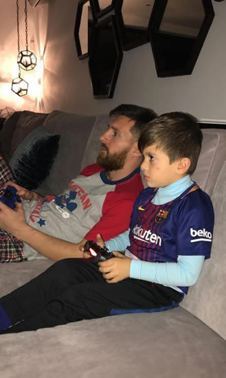 Lionel Messi and son Thiago face off on Fifa 18 as wife Antonella captures family battle