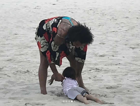 Real Madrid star Marcelo spotted in a dress while playing football on Brazilian beach