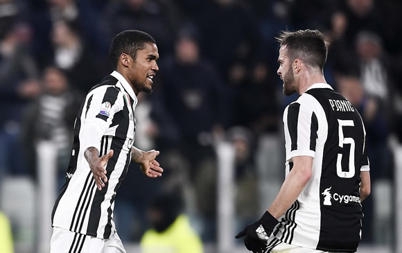 Juventus 2 - 0 Torino: Defending champions reach semi-finals