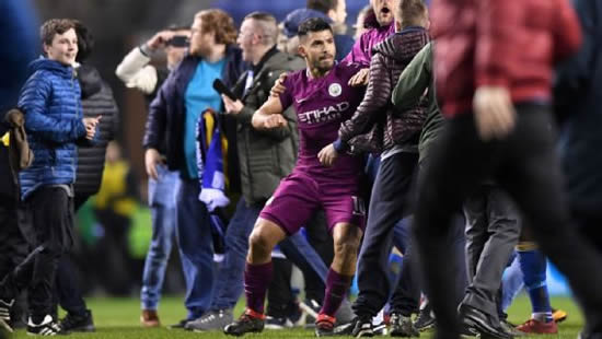 Sergio Aguero appears to clash with Wigan fan on pitch