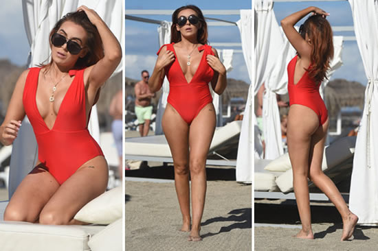 WAYNE Rooney girl Laura Simpson went full Baywatch as she sizzled in the sun while on holiday – but she still had time to totally roast trolls on Twitter.