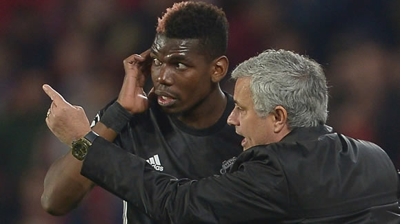 Manchester United boss Jose Mourinho challenges Paul Pogba