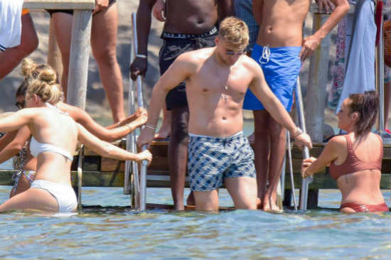 Manchester United defender Luke Shaw shows off bulky torso as ace enjoys summer off-season on luxury yacht in Ibiza