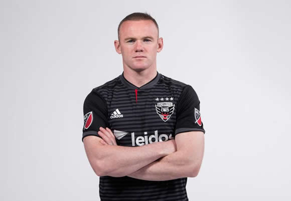 Wayne Rooney mobbed by DC United fans as he arrives in the US… so will Coleen follow him to Washington?
