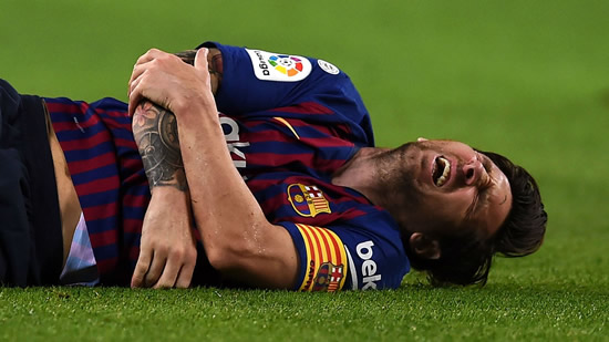 Messi to miss Clasico with fractured arm