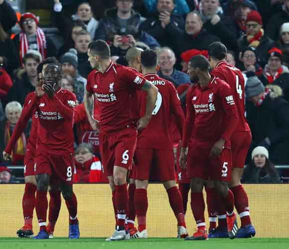 Liverpool 3 Manchester United 1: Shaqiri's late show bails out Alisson as Reds return to the top