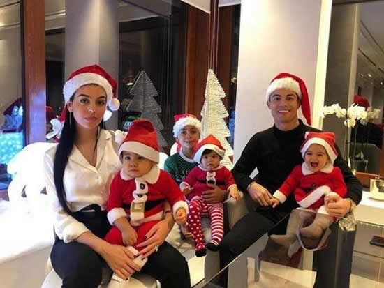 Football stars get in Christmas spirit as they celebrate the big day with Wags and families