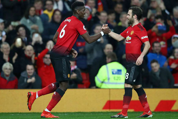 Manchester United 3 Huddersfield Town 1: Pogba strikes twice in happy homecoming for Solskjaer