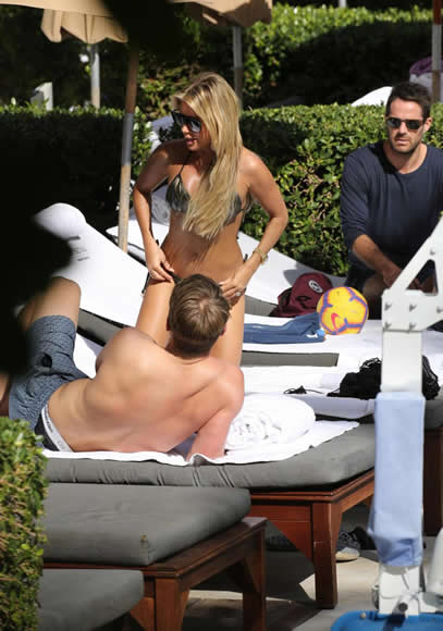 Jamie Redknapp ogles Rafael van der Vaart's ex-wife Sylvie Meis while poolside in Miami