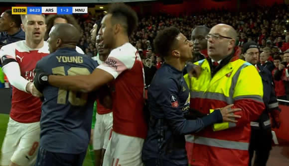 Man Utd star Lingard in spat with Arsenal fans after coin was thrown as tempers boil over