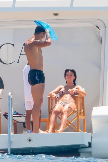 Georgina Rodriguez stuns in tiny bikini while playing with partner Cristiano Ronaldo and kids on luxury yacht during France family holiday