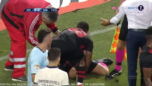 Northern Irish ref Arnold Hunter hit by flare and lighter in shocking scenes during Europa League clash between Craiova and Honved