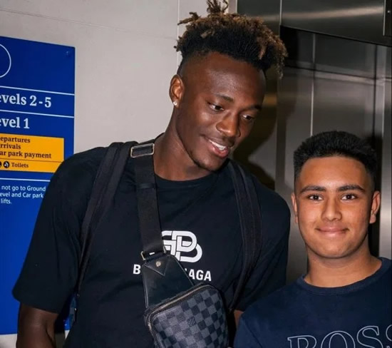 TAM OFF Tammy Abraham gets over England snub by jetting to Barcelona with girlfriend… and posing for a selfie with a fan