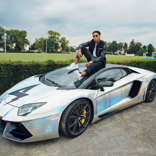 AUBA THE TOP Arsenal ace Aubameyang slated for ‘ruining’ his £2m red LaFerrari supercar by wrapping it in chrome