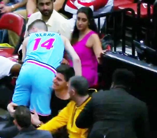 COURT OUT Real Madrid star Thibaut Courtois mocked as he ‘makes only save all year’ while helping NBA star who leapt into crowd