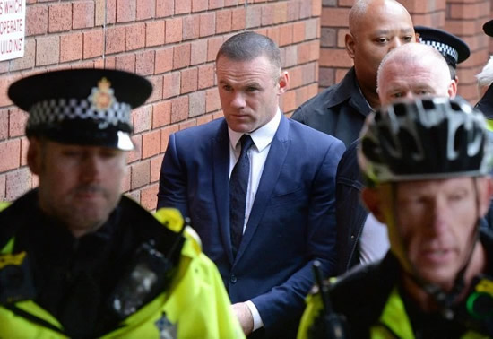 BACK ON THE ROOD Wayne Rooney seen behind the wheel for first time since two-year drink-drive ban (and he’s already on a double yellow)