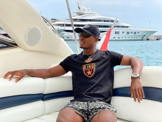 SEA ME ROLLIN' Ighalo sings and plays music on a boat as Man Utd striker enjoys his holiday after helping secure Champions League spot
