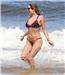 Water sight! ... Kelly Brook enjoys a splash about with pals in Trancoso, Brazil