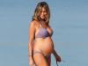 Beach bump ... pregnant Georgina Dorsett shows off her blossoming figure