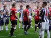 The United players are applauded onto the pitch by the West Brom players