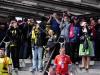 Fans take photos of the stadium as they disembark from Wembley Park tube station