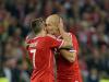 Robben kisses Ribery after Robben scored winning goal