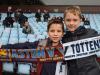 Eager anticipation: Young fans with their matchday souvenir scarves ahead of the Premier League clash between Villa and Spurs