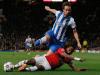 Patrice Evra goes in hard to stop Real Sociedad's Mikel Gonzalez forage forward as the the Spanish side push forward in search of the equaliser in the second half