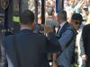 Neymar, in trademark hat and dark glasses, is off the Barcelona bus and heads towards the Grand Hyatt hotel where Barcelona will be staying. 