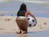 BEACH BUM: Claudia got cheeky in her mismatched bikini