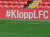 Jurgen Klopp walks onto the Anfield pitch