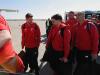 Adam Lallana makes his way onto the Liverpool plane with the squad