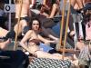 The mystery woman stunned in a brown bikini Credit: BackGrid