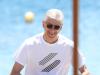 The legendary Arsenal boss was all smiles as he caught some sun in Mykonos, Greece Credit: BackGrid