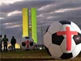  Anti-World Cup protesters inflate giant footballs in Brasilia 