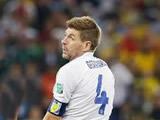  Gerrard's head hangs low after gaffe leads to crushing England loss 