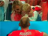  Cute: Arjen Robben consoles crying son with his wife after Holland lose on penalties to Argentina 